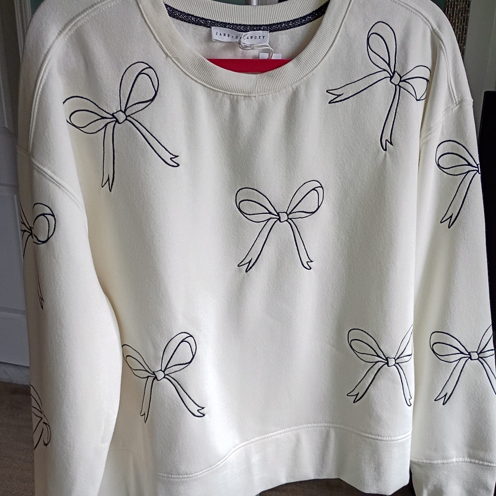 Jane and Delancey Cream Sweatshirt with Black Bow Print